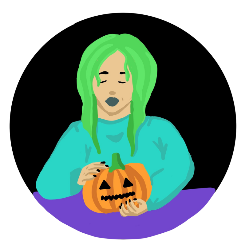 A woman holding a carved pumpkin